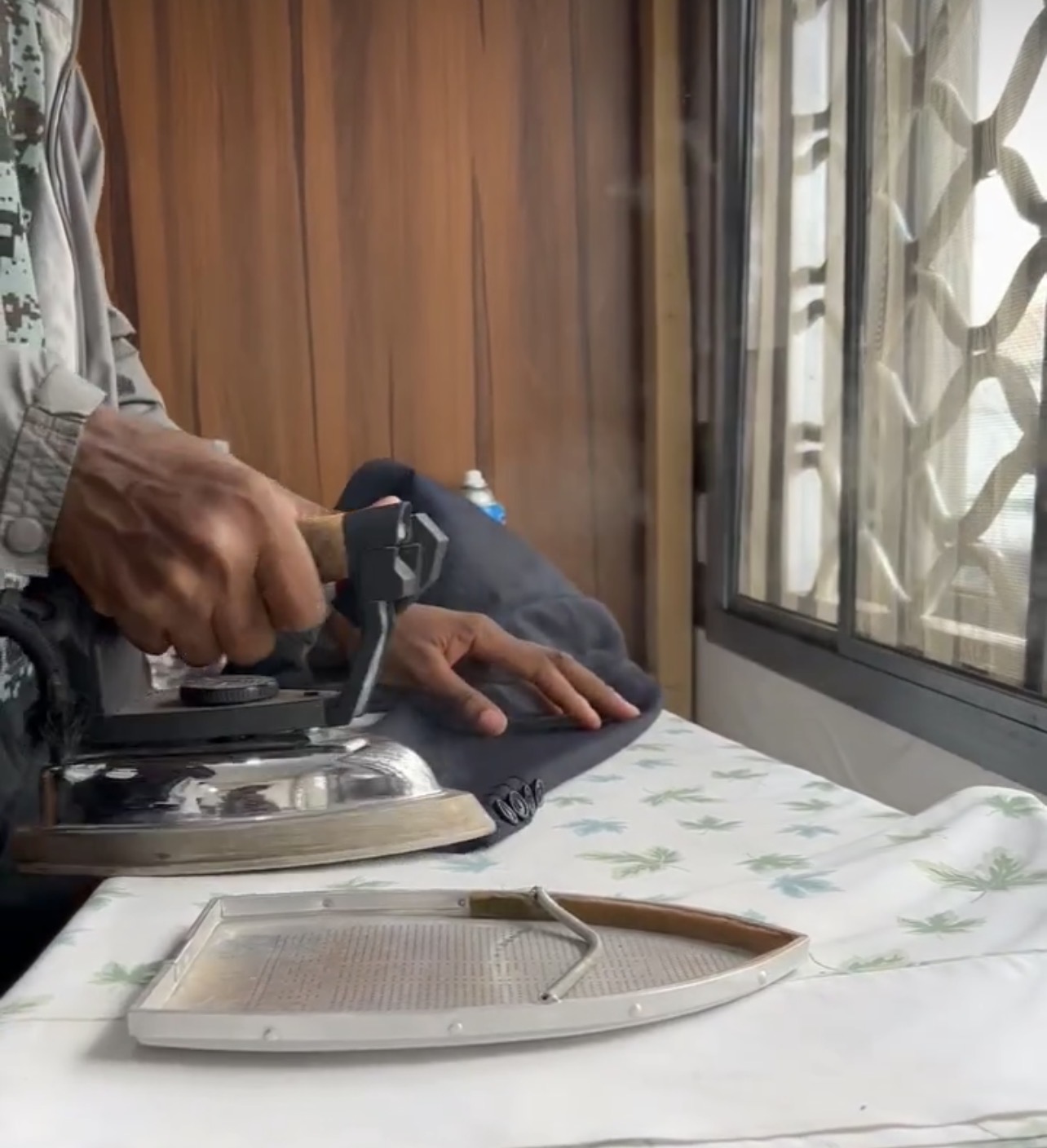 Professional garment ironing at JOKBIS Laundromat